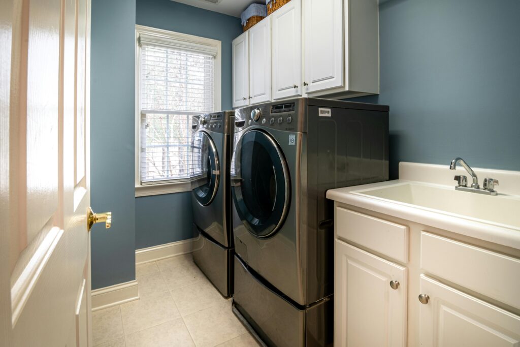 pexels-photo-3935334-3935334 Front Load Washing Machine Beside White Window Blinds
